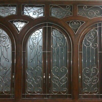 Stainless steel window grill with wooden frame